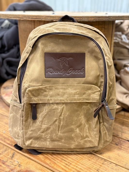 Tan waxed canvas backpack